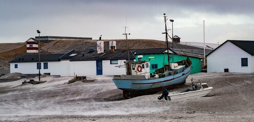 Fototapeta premium traditional fisher boats on the beach in northern Denmark in norre vorupor