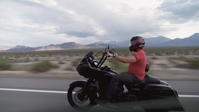 Biker driving on the Highway on legendary Route 66 to Oatman, Arizona.