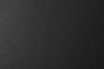 Close up view of black rock abstract design, texture.	