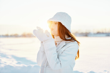 Fototapeta na wymiar young woman winter clothes walk snow cold vacation nature