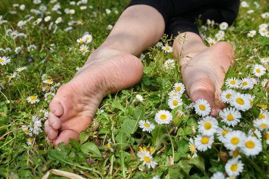 Girl with dirty bere feet soles arter walking