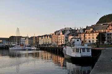 Alesund, Norway - 05 July 2011: Old colorful houses on the waterfront in Alesund, Norway in the...