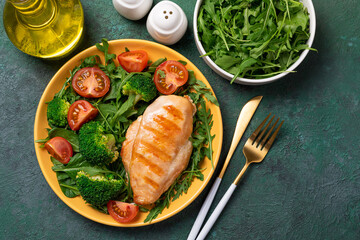 Grilled chicken breast, chicken fillet and fresh vegetable salad. Healthy lunch menu. Healthy food, keto diet, dieting lunch concept