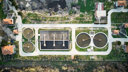 Sewage water treatment plant. Water purification plant top down aerial view. Sustainable water recycling facility.