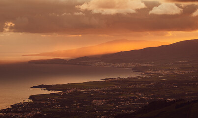 Fototapeta na wymiar Amazing sunrise, view over the island, Azores travel destination.