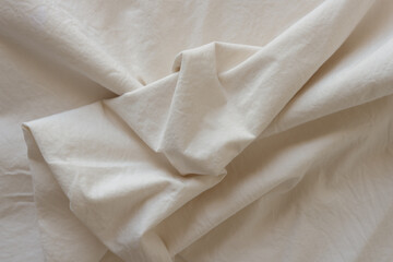 soft fabric background with folds and creases