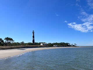 The black and white diamond pattern of the Cape Lookout lighthouse in the Outer Banks of North...