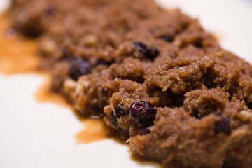 Making of classic strudel fille with apples, cranberries, walnuts and cinnamon
