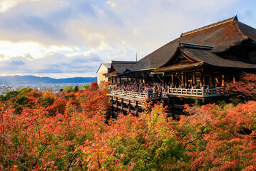 Fototapeta na wymiar Tourist on the main wooden pavilion of Kiyomizudera Temple in Autumn, Kyoto, Japan