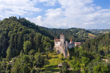 Landscape with medieval Bran castle known for the myth of Dracula. Bran or Dracula Castle in...