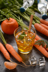 delicious carrot and mandarin cocktail with ice