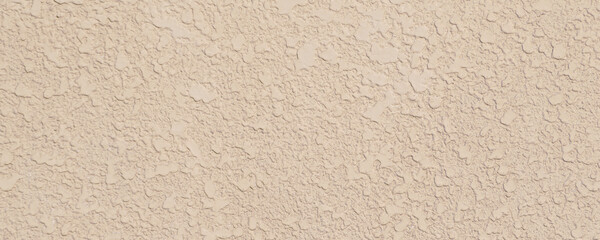 ベージュ色の壁の背景テクスチャー