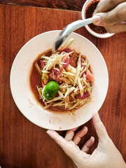 Thai food. Delicious and spicy Som Tam salad (or Papaya Salad)