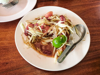 Thai food. Delicious and spicy Som Tam salad (or Papaya Salad)