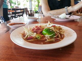Thai food. Delicious and spicy Som Tam salad (or Papaya Salad)