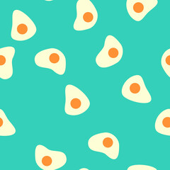 Seamless pattern with fried eggs. Abstract pastel pattern with eggs. Random, chaotic blue background with cute omelette.