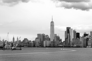 Obraz premium Black and white photo of famous New York City panorama with skyscrapers of Manhattan on the background. Travel, tourism, sightseeing of nyc, USA.