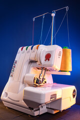Professional overlock sewing machine with multicolored thread