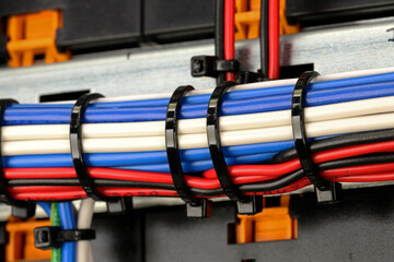 Plastic cable ties close-up on the mounting wires.