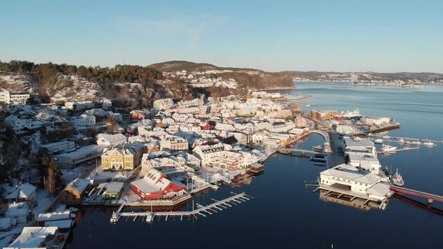 Coastal Town Of Kragerø With Waterfront Restaurants And Architectures At Winter In Norway. - aerial pullback