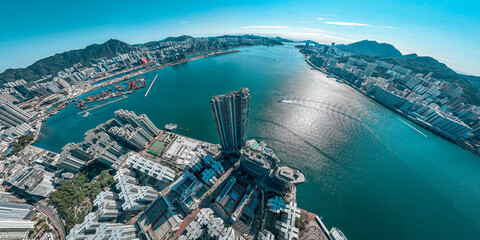 Naklejka premium Aerial view of Hong Kong city in a sunny day