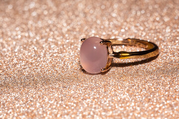 Gold ring with pink chalcedony