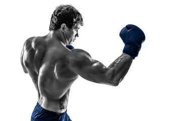 Side view of boxer in blue gloves who practicing uppercut on white background. Black and white