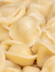 Boiled dumplings made from dough and meat.