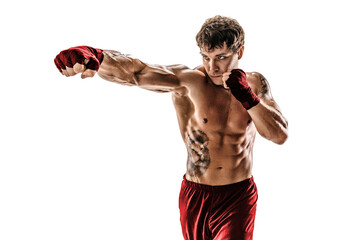 Portrait of male muscular boxer who training and practicing jab on white background. Red sportswear