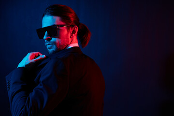 Fototapeta na wymiar portrait of a man modern style suit fashion sunglasses lifestyle model