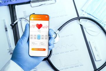 Doctor online medical application. Doctor holding digital smartphone. Healthcare medicine app on...
