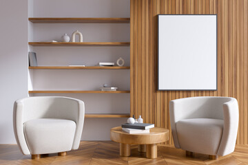 Fototapeta na wymiar Bright living room interior with empty white poster, armchairs, shelves