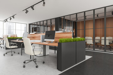 Bright office room interior with desktops, desks, armchairs, panoramic windows