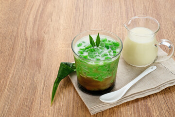 Es Cendol or Dawet is a traditional Indonesian dessert consist of cendol (made from rice flour), coconut milk and palm sugar. Popular during Ramadan.
