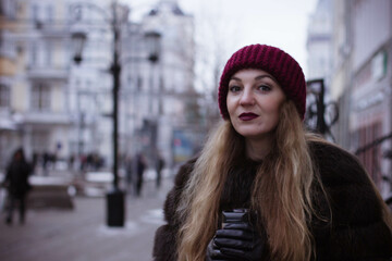 portrait of a girl in winter in a fur coat