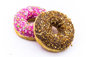 pink and brown doughnut, chocolate and berry doughnut, strawberry and raspberry doughnuts, walnut donut on a white background
