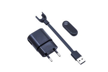 smart watch on charge, fitness watch and charger, sports watch on white background