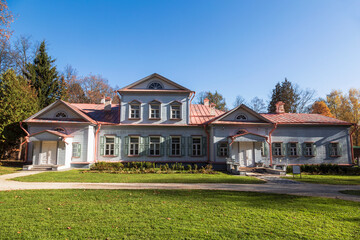 Fototapeta na wymiar The main manor house in the Abramtsevo Museum-Reserve in sunny summer day . Moscow region, Russia