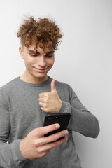 kinky guy talking on the phone posing emotions isolated background