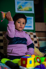 child playing drum in fun .