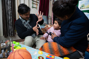 parents spending their time with their children .