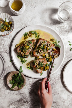 roasted tuna with olives and herbs