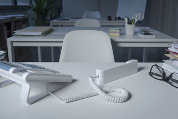 Work telephone call with handset off-hook