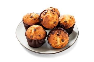 Chocolate chip muffins isolated on white background.	