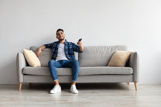 Young Arab Guy Spending Weekend Watching Tv