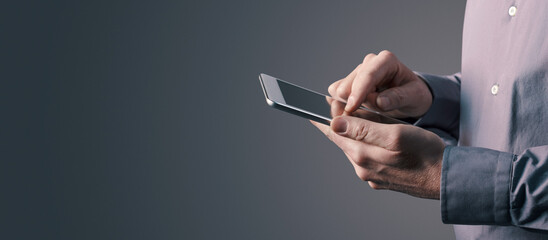 Businessman using his smartphone