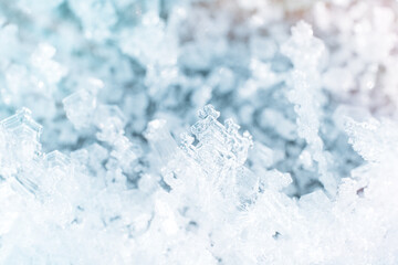 Crystal structure of ice against blurred background.