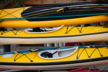 Kayaks and SUP board storage on top of each other