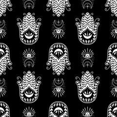 Fototapeta premium Mystic seamless pattern hamsa and evil eye symbol.Esoteric magic occult amulet.Abstract hand drawn style.