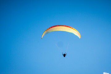 paragliding flight in the mountains. Le Grand-Bornand, France